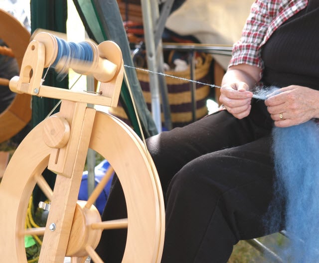 Woman Using a Spinning Wheel